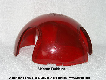 A red Bio-Serv Mouse Igloo®.